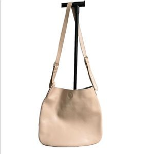 Genuine leather light pink exterior blue suede lining interior hobo handbag